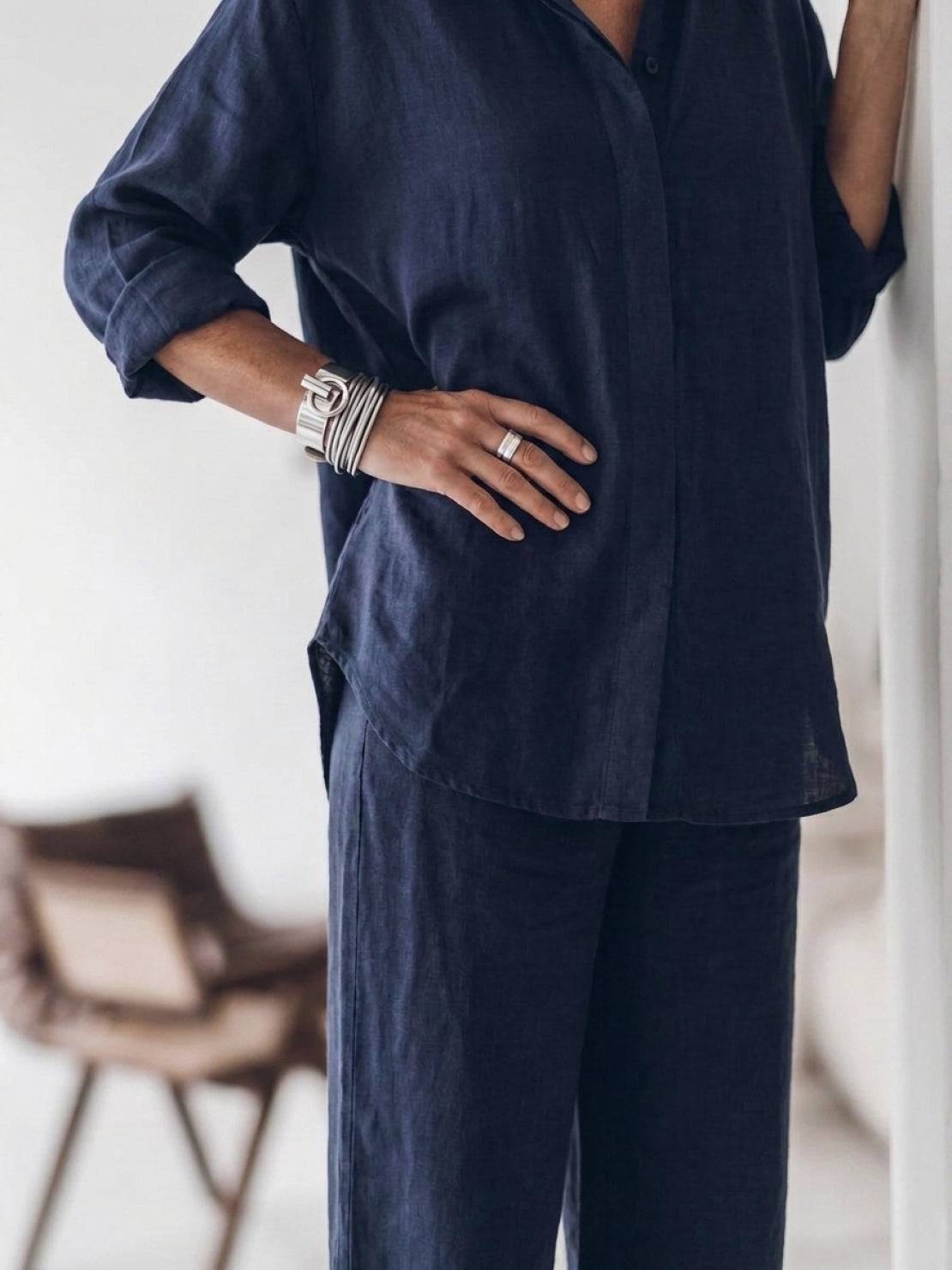 Model wearing oversized 100% cotton shirt and wide-leg pants co-ord set in relaxed style