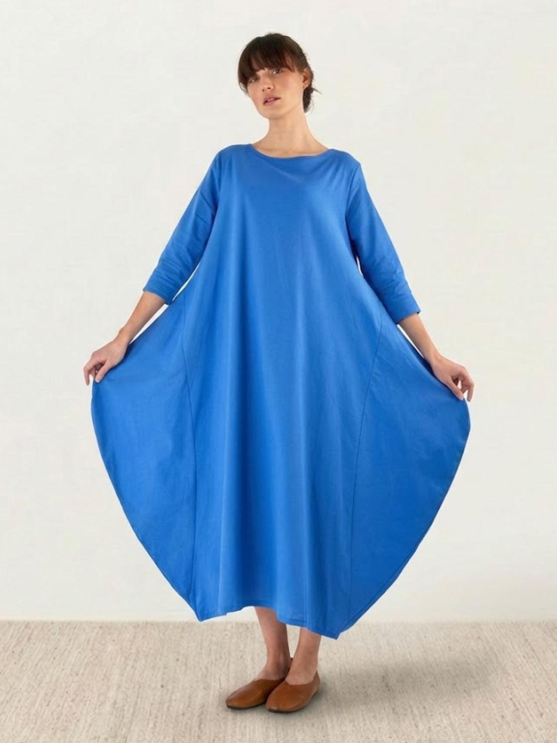 Bohemian maxi dress in loose fit with long sleeves, breathable linen blend, and floor-length design.