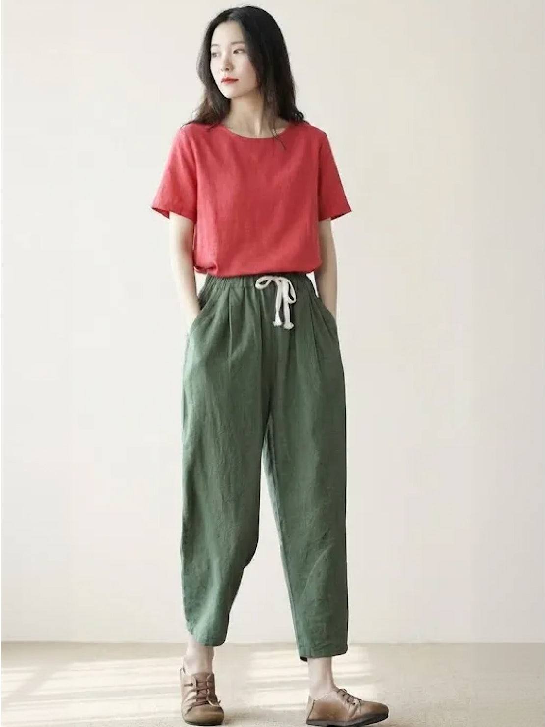 woman wearing breezy relaxed fit straight pants in casual setting