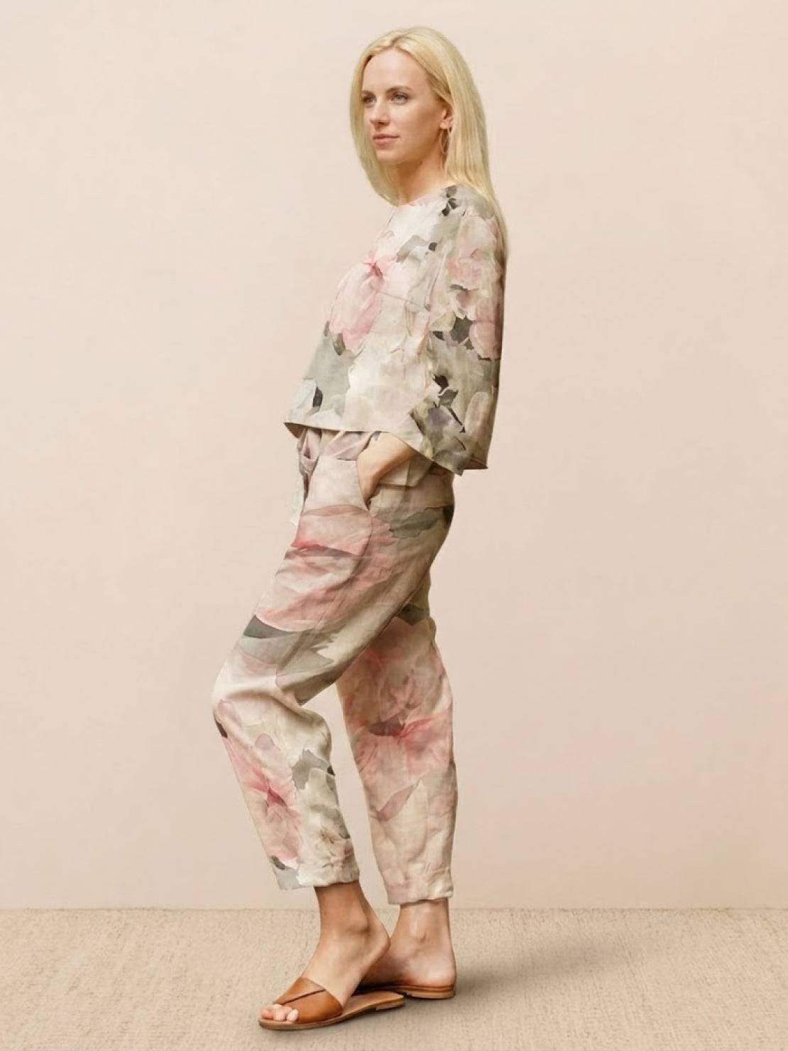 Minimalist cotton-linen monochrome capsule outfit with relaxed longline top and wide-leg pants