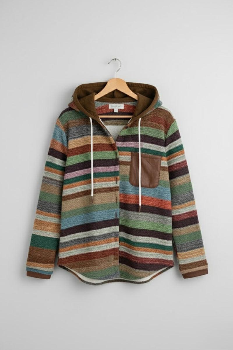 Highland Plaid Shacket with colorful striped pattern, attached hood, and front chest pocket hanging on wooden hanger