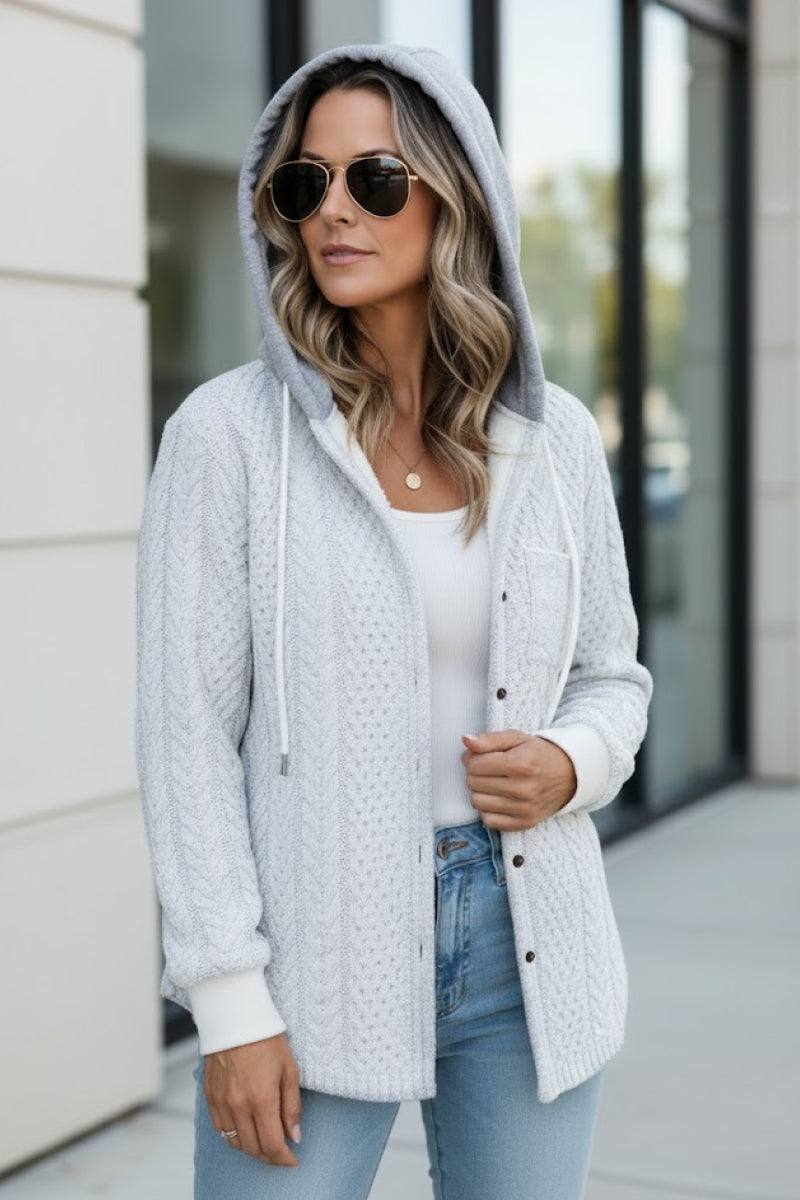 Woman wearing a gray hooded Highland Plaid Shacket with button front and casual fit outdoors