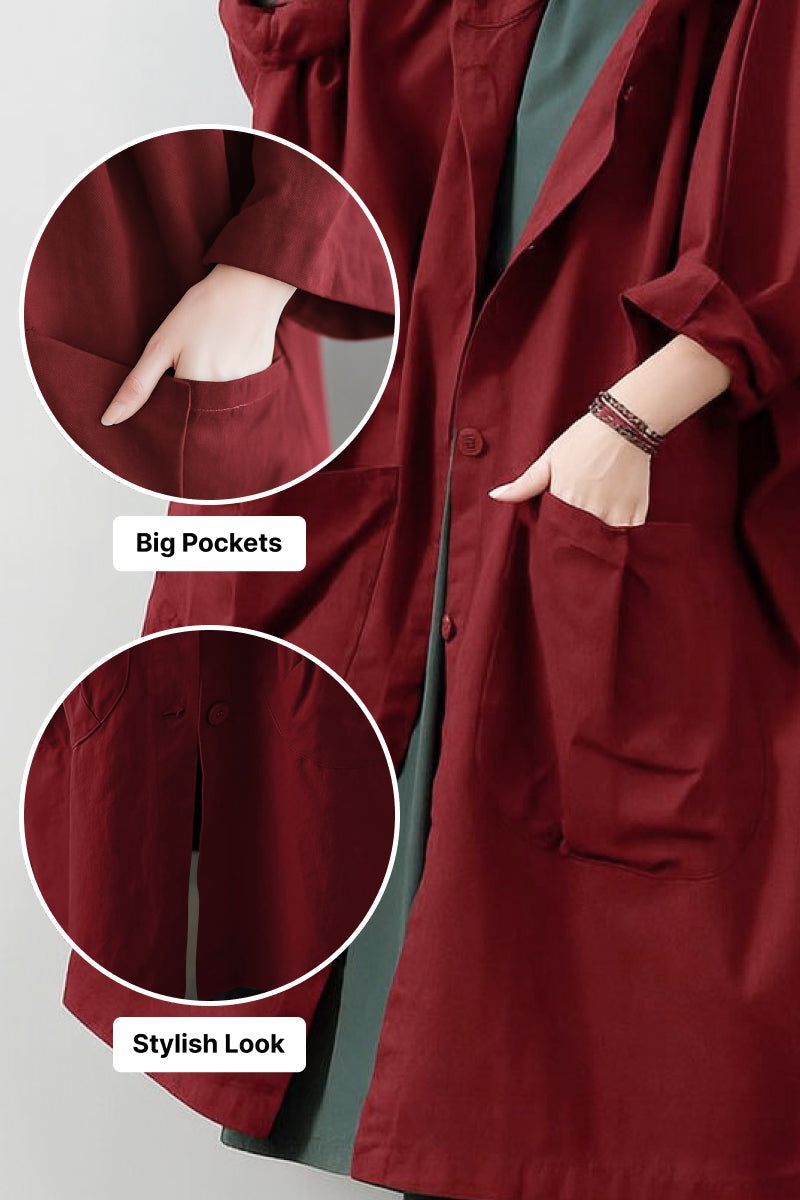 Oversized water resistant windbreaker jacket in deep red with large front pockets and attached hood for stylish, practical layering
