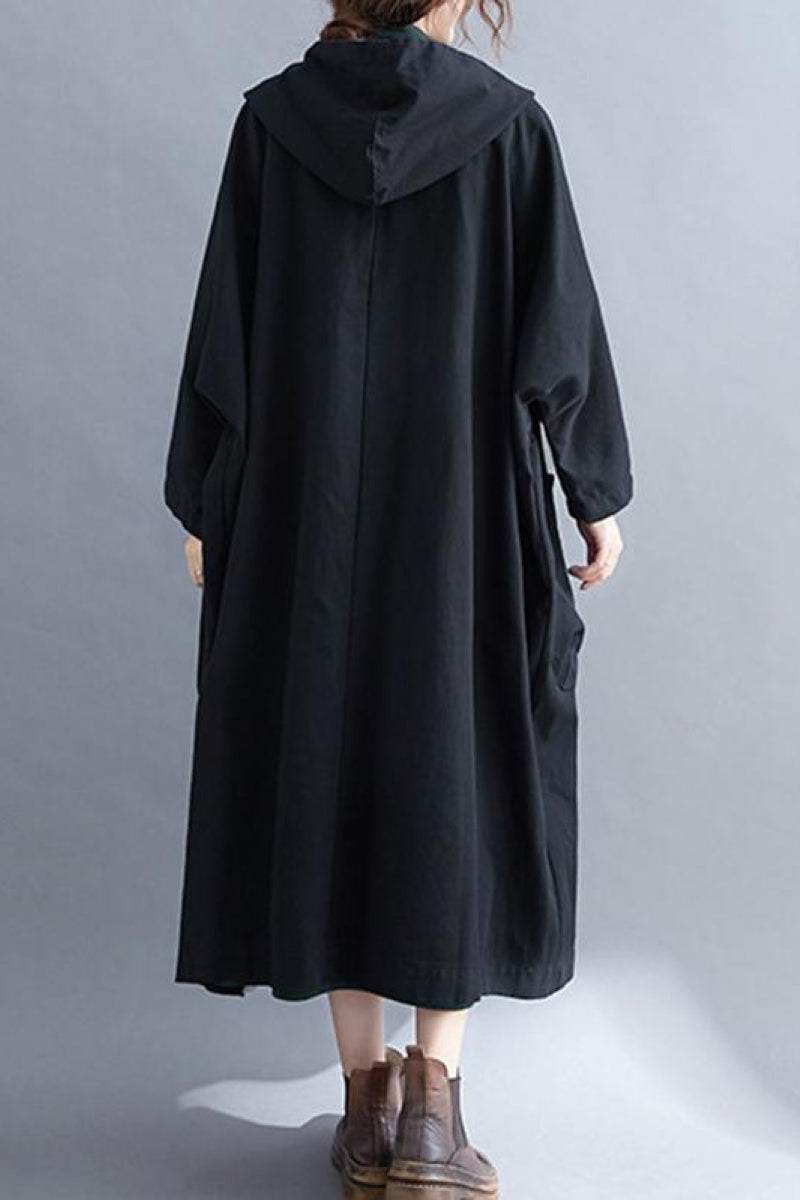 Back view of one size fits all oversized black windbreaker jacket with waterproof design and attached hood