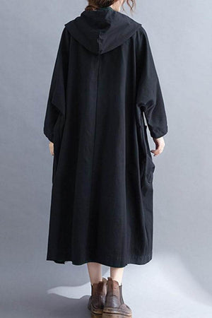 Back view of one size fits all oversized black windbreaker jacket with waterproof design and attached hood