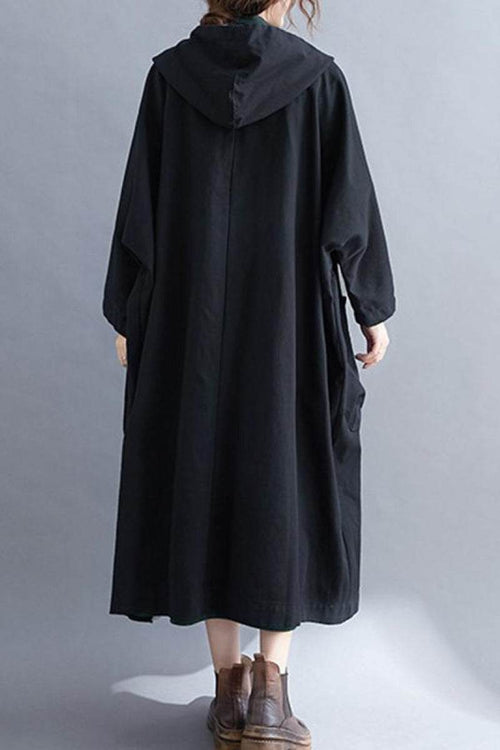 Back view of one size fits all oversized black windbreaker jacket with waterproof design and attached hood