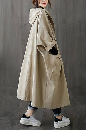 Oversized water-resistant windbreaker jacket with waterproof design and attached hood for all-season wear