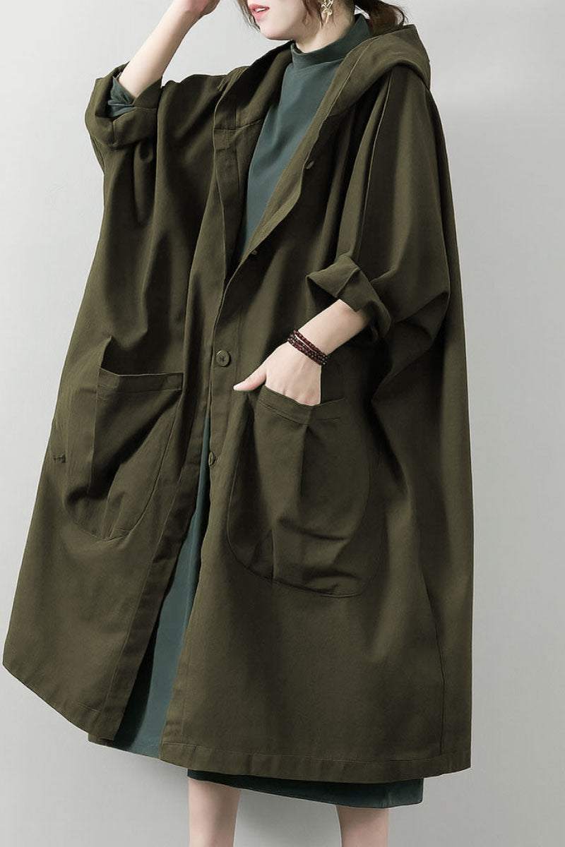 Oversized one-size water-resistant windbreaker jacket with hood and large front pockets featuring waterproof design