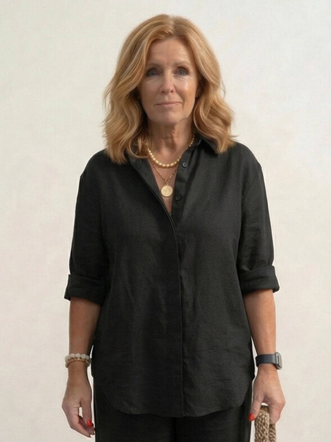 Model wearing oversized 100% cotton shirt and wide-leg pants co-ord set in relaxed silhouette