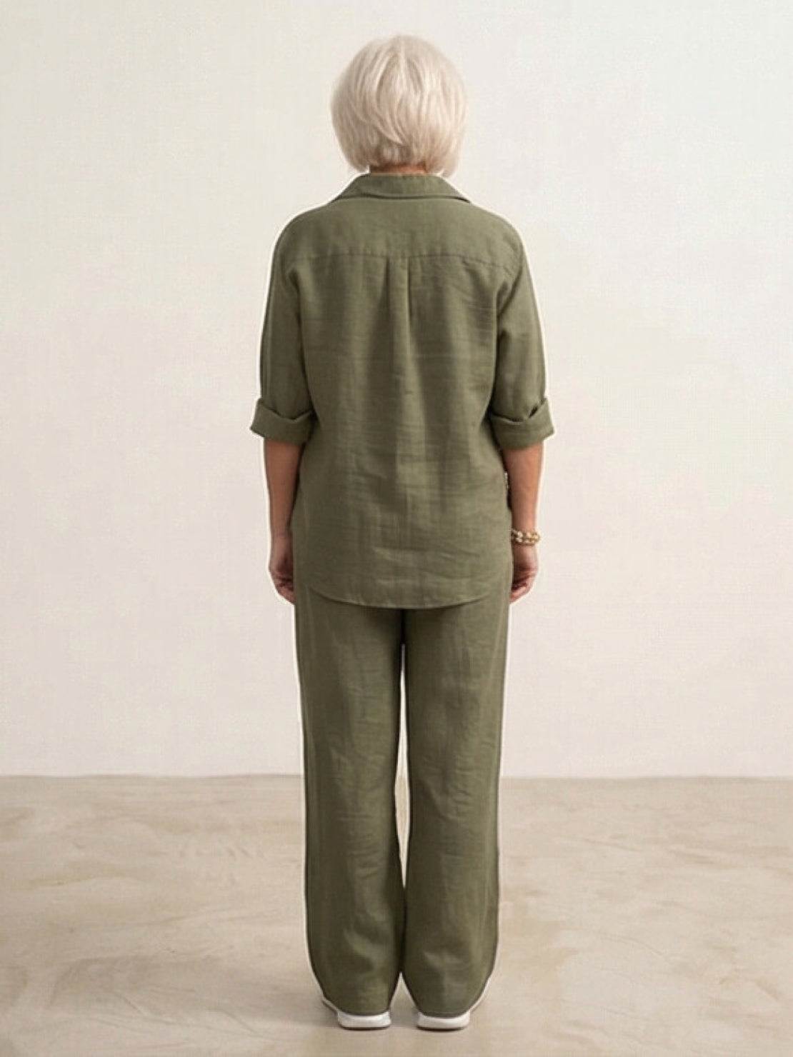 Woman wearing oversized 100% cotton shirt and wide-leg pants co-ord set