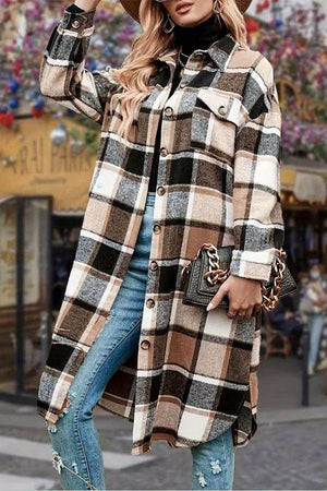 Oversized medium-length plaid overshirt in blue and beige tones styled with jeans and a black turtleneck