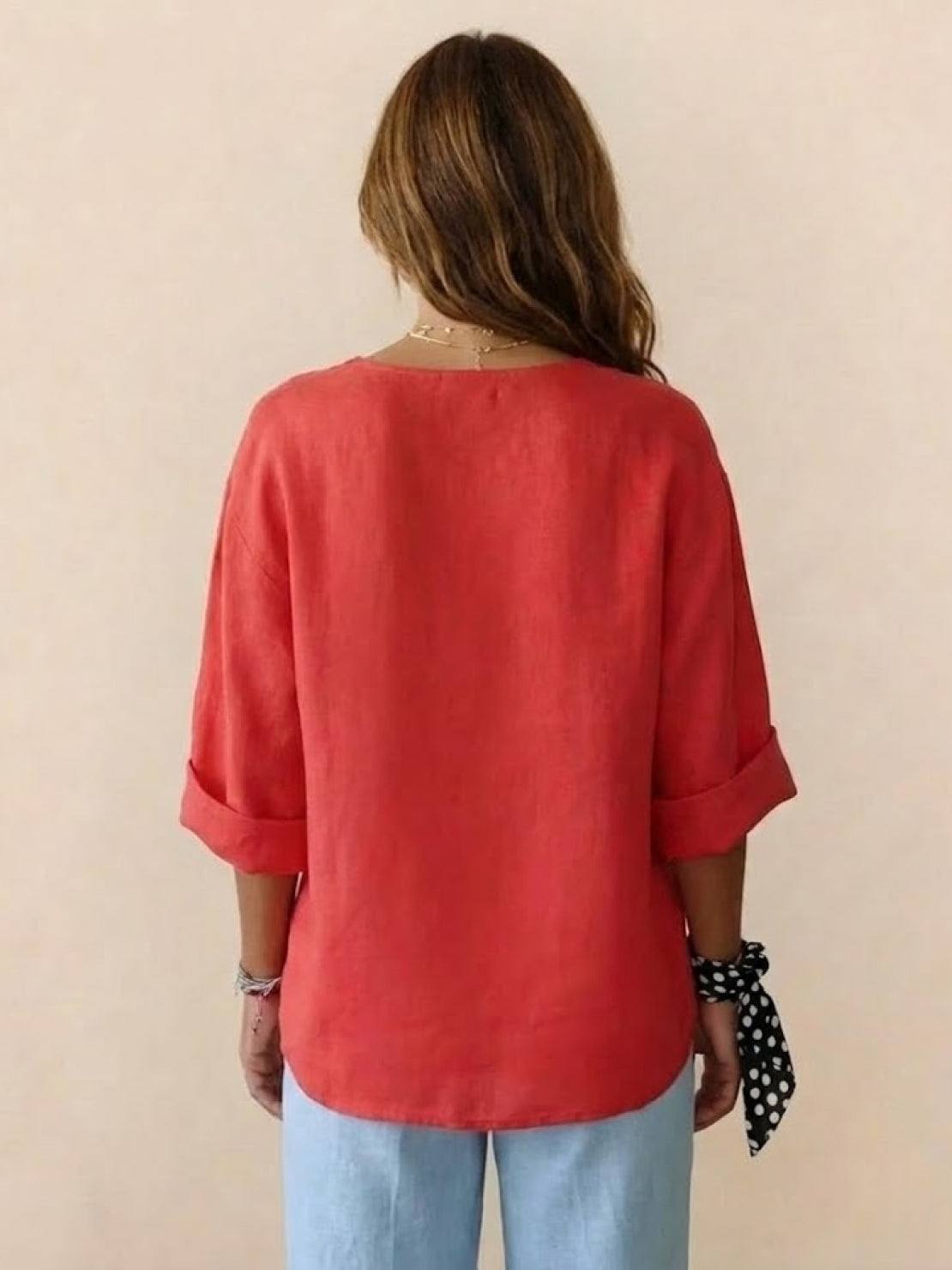 white pure linen age-defying shirt with button detail on hanger