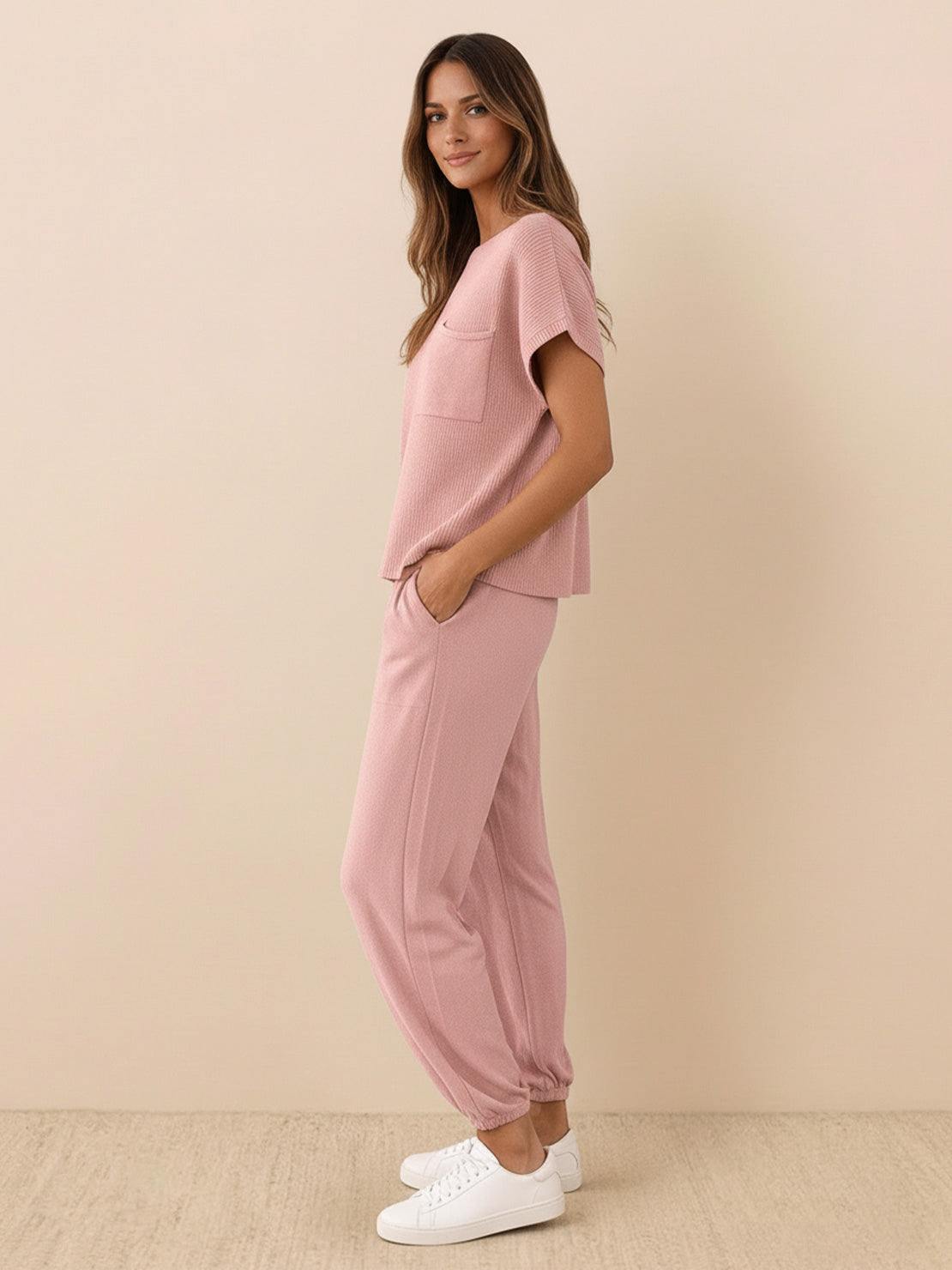 Woman wearing a Comfy Couture Knit Sweater two-piece set in a relaxed fit with matching knit pants