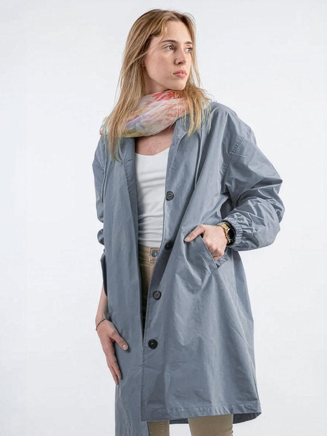 Water-Resistant Oversized Windbreaker rain jacket with hood and multiple pockets for outdoor activities