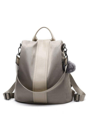Anti theft waterproof fashion backpack with adjustable straps and multiple compartments in beige