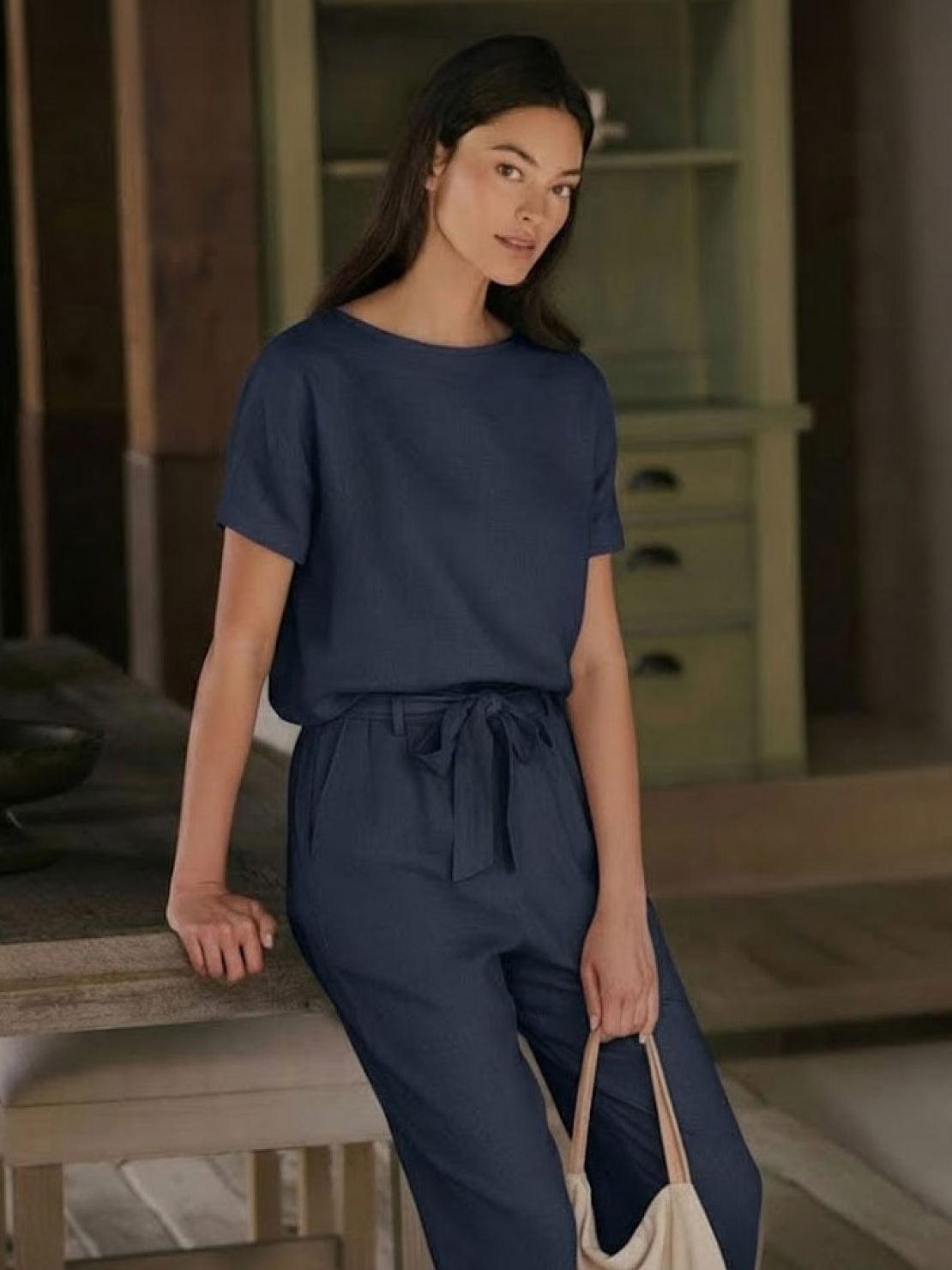 Woman wearing relaxed monochrome cotton linen set with short-sleeve top and straight-leg pants