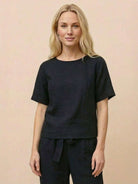 Cotton linen monochrome relaxed short-sleeve top with natural texture and breathable fabric