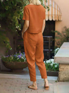 Straight-leg cotton linen monochrome pants with adjustable drawstring waist on model