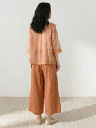 100% Cotton Linen Tuscany Rise 2 Piece Set with sheer embroidered top and wide-leg linen trousers in natural breathable fabric