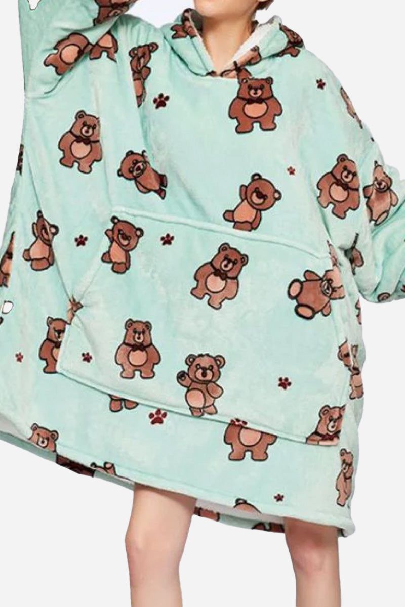 Snuggly oversized hooded fleece sweater with bear print, soft, warm, and cozy blanket-style design.