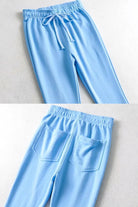 Light blue comfy wide-leg pants with elastic waistband and back pockets made from breathable sustainable fabric