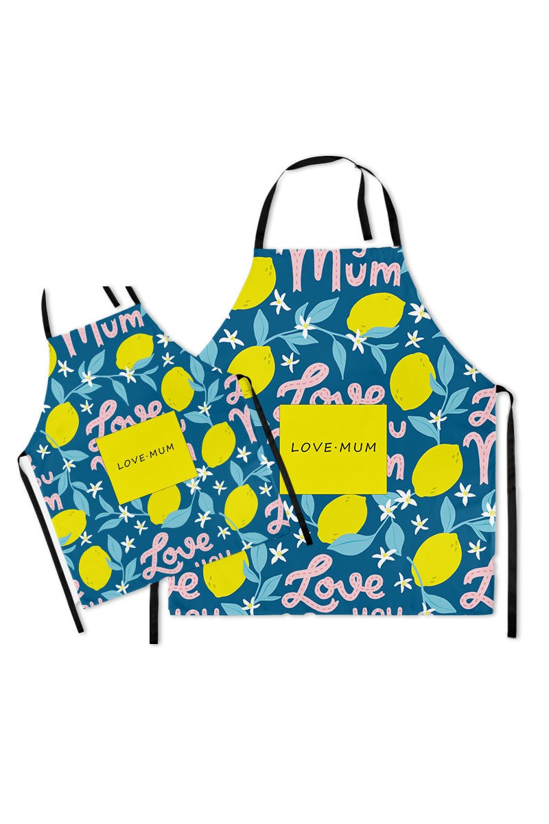 Matching Mommy & Me Apron Set with lemon pattern and "Love Mum" text, durable cotton linen, oil-proof coating, and convenient pockets for cooking and bonding.
