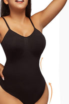 Black seamless TummyToning Bodysuit with adjustable straps, tummy control, and chest lifting design.