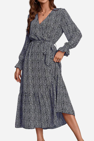 Bloom Wrap Midi Dress in comfortable chiffon with floral print, A-line silhouette, and long trumpet sleeves.