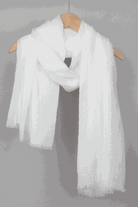 White linen Color-POP scarf hanging on wooden hanger, lightweight and warm eco-friendly fabric