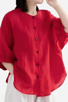 Relaxed loose breathable linen blouse in vibrant red with button-down front and short sleeves