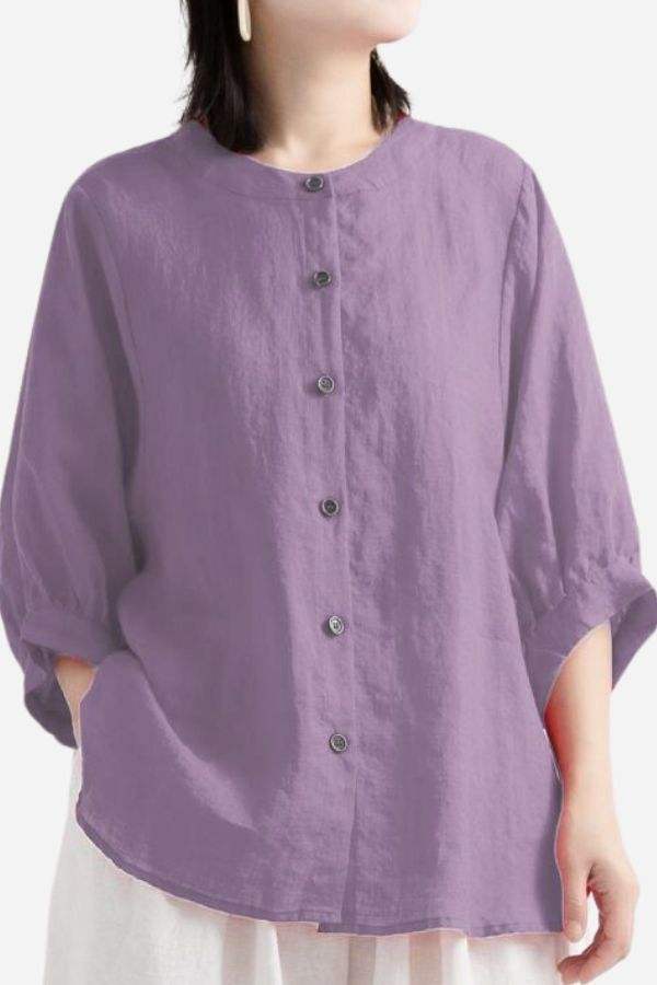 Relaxed loose breathable linen blouse in purple with button-down front and three-quarter sleeves