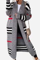 Cozy striped long knitted cardigan with oversized fit and soft fabric for warmth and style