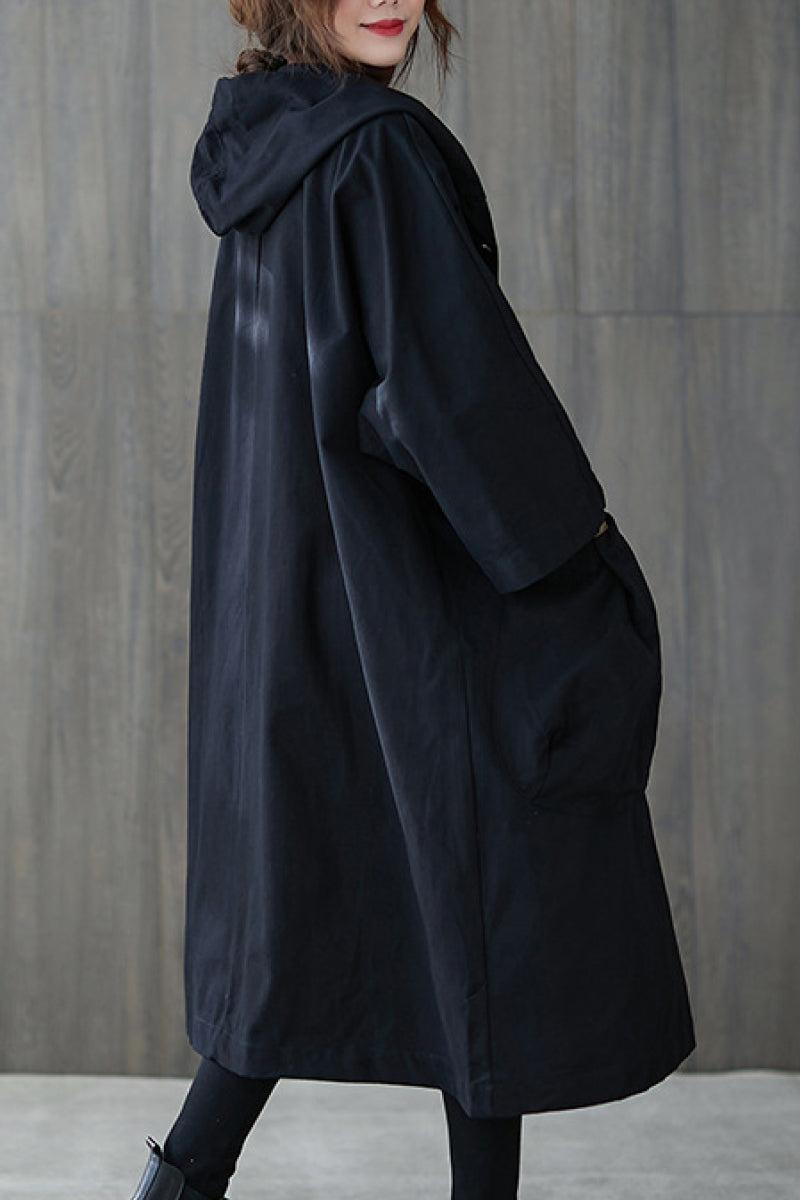 Black oversized water resistant windbreaker jacket with hood and pockets for women