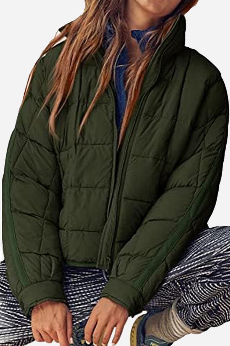lightweight puffer travel jacket packed compactly and worn for versatile travel warmth