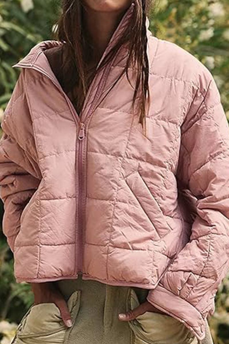 Lightweight puffer travel jacket compressible and stylish for versatile travel use