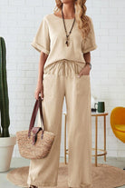 Women’s rolled cuff top and patch pocket pants set in beige relaxed fit cotton blend fabric