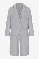 Gray blazer and high-waisted shorts two-piece set with classic collar and tailored fit