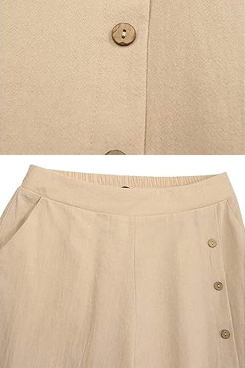 Beige wide leg pants with elastic narrow waist and side button detailing