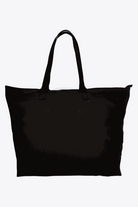 Black waterproof travel bag with sturdy handles and spacious design for versatile packing