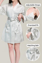 Woman wearing a white Mulberry silk nighty and robe set with adjustable straps, oversized fit, and matching belt