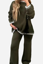 Woman wearing chic contrast stitch olive green travel set with white trim