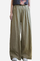 Women wearing wide-leg sandwashed ramie linen pants with elastic waistband and pockets