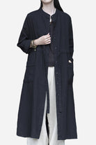 Oversized casual loose ramie linen cardigan in black with front pockets and button closure