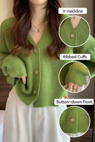 Green casual loose boxy cardigan with V-neckline, ribbed cuffs, and button-down front in soft knit fabric