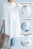 White pure cotton long shirt with classic stand collar, curved hemline, and relaxed adjustable sleeves, styled oversized for casual elegance.