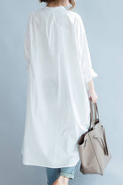 One size pure cotton long shirt in white with oversized fit and button-front design.