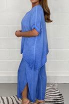 Relaxed linen-like travel 2-piece set in blue, lightweight and wrinkle-resistant outfit for comfortable and stylish travel.