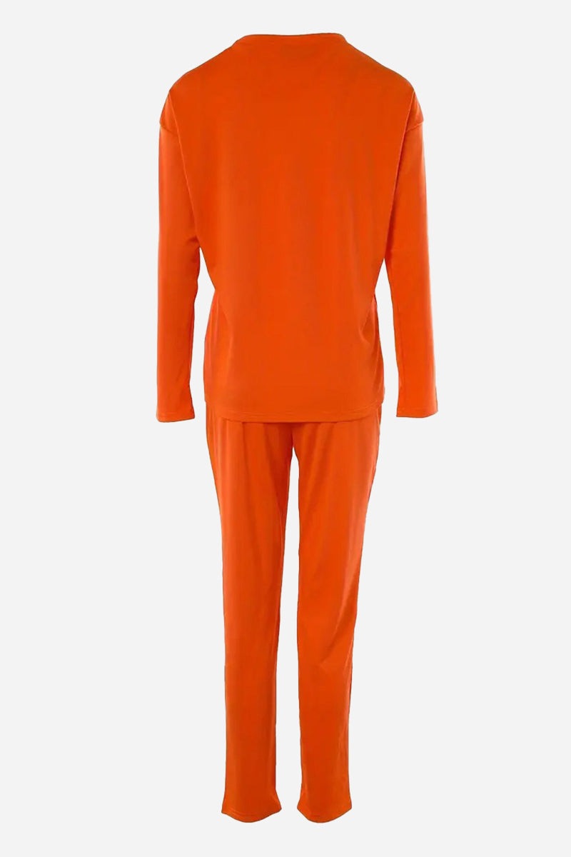 Back view of vibrant orange cotton two-piece set with long sleeves and pants, breathable and comfortable fabric.