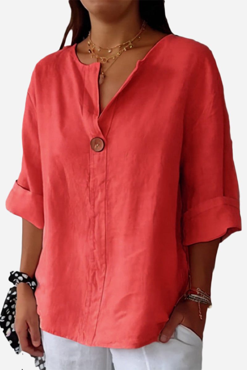 Coral pure linen age-defying shirt with button detail and relaxed fit for breathable comfort and style.