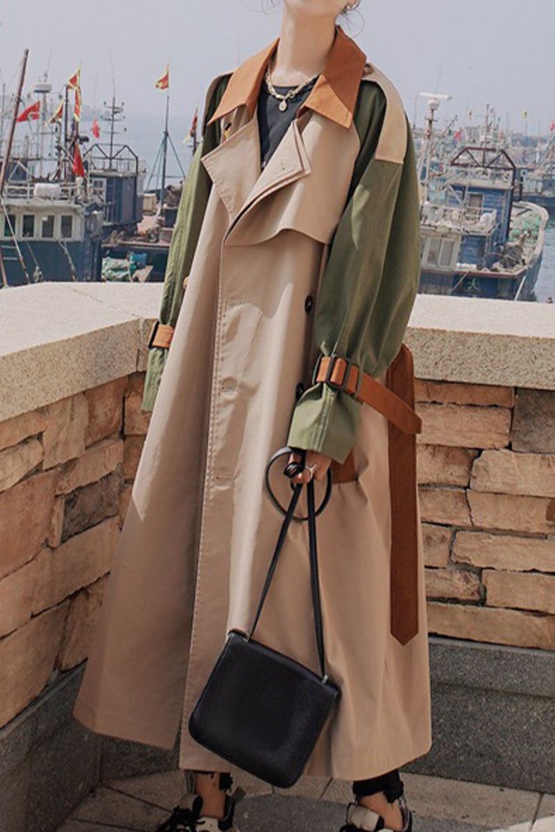 Urban Chic Oversized color block windbreaker trench coat with beige, green, and brown panels and adjustable sleeve straps.